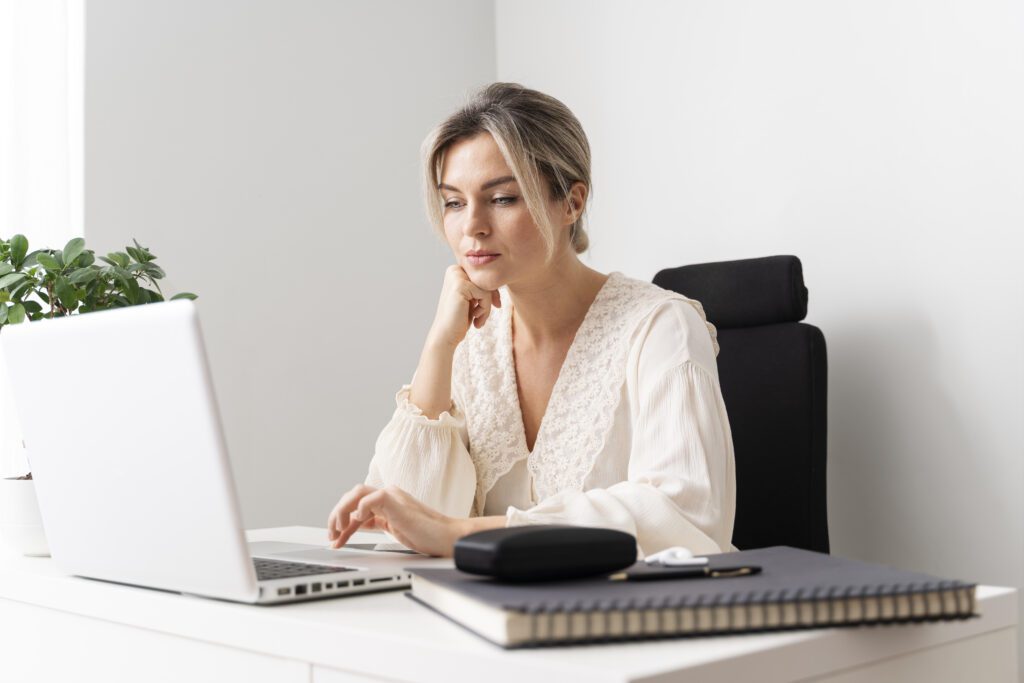 woman looking at health insurance plans
