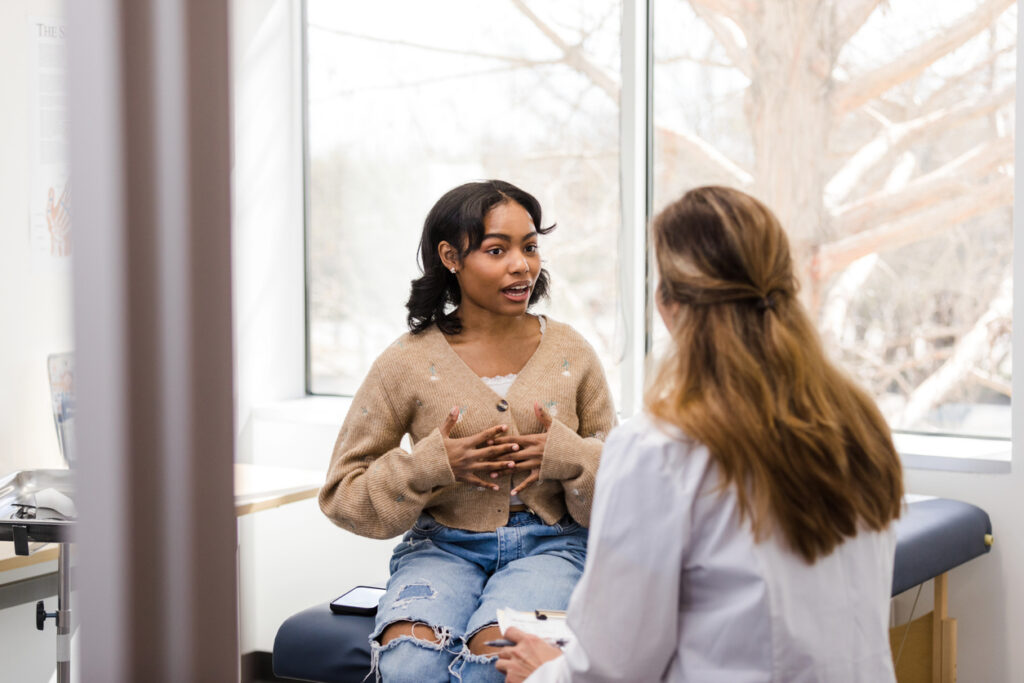woman talking to her healthcare provider