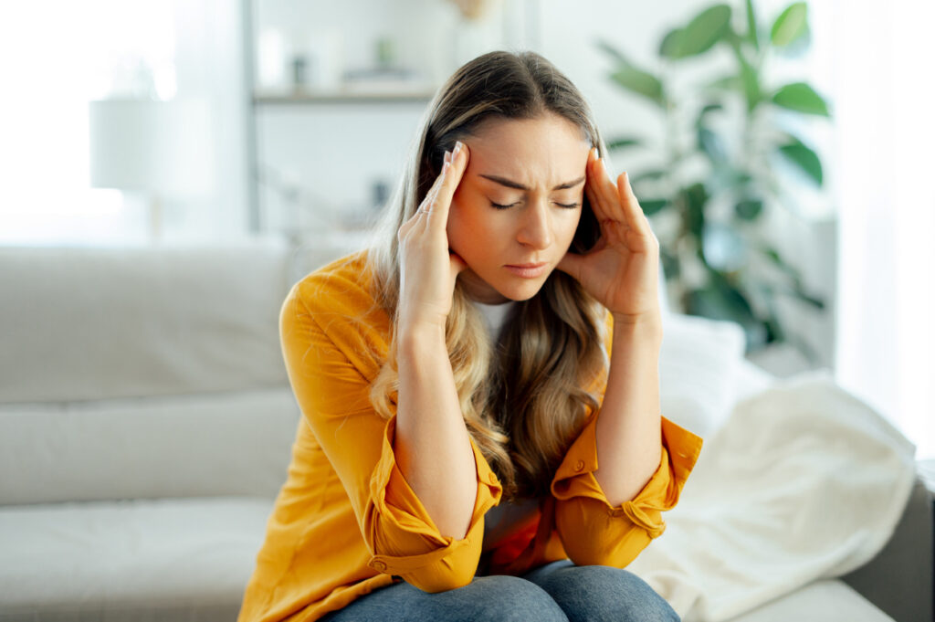 woman experiencing PMS