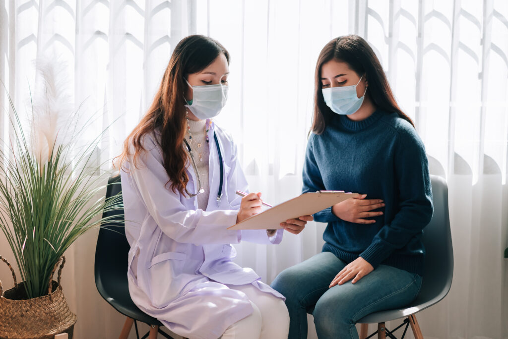 doctor consulting woman about hysterectomy procedure