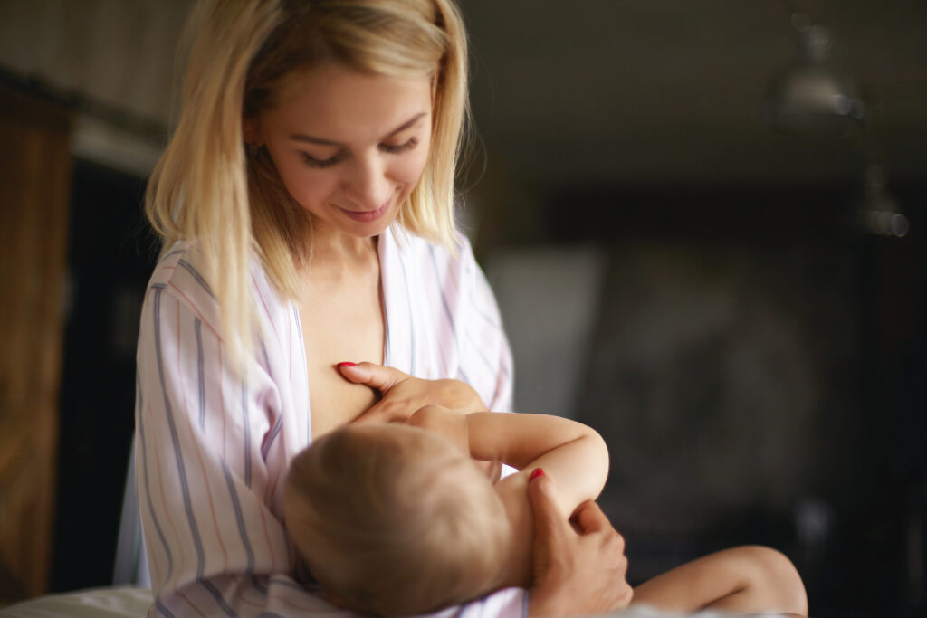 woman breastfeeding her baby