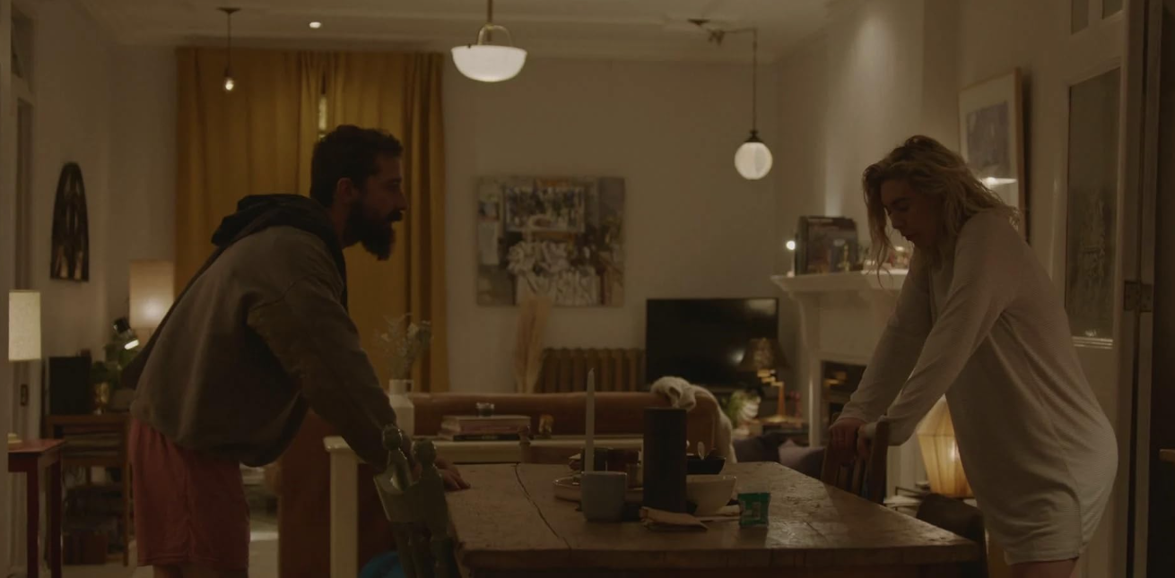 Pregnant woman at home with her partner during a scene from Pieces of a Woman.